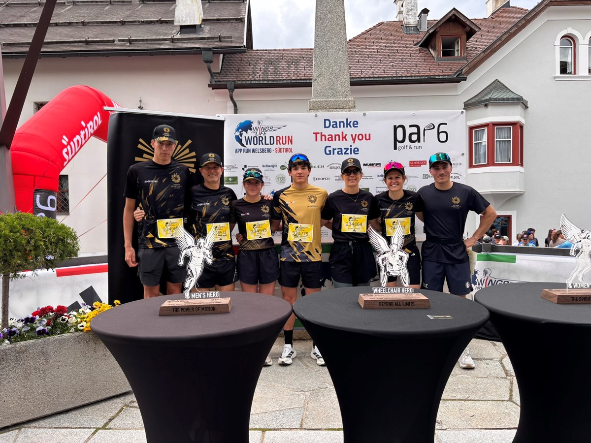 Das Läuferteam der Südtiroler Sporthilfe: Langläufer Lukas Schwingshackl, Vorstandsmitglied Heinold Pider, Läuferin Katrin Kaltenhauser, Langläufer Johannes Mair, Geschäftsführerin Evi Hilpold, Läuferin und Langläuferin Julia Kuen sowie der Naturbahnrodler Daniel Gruber.